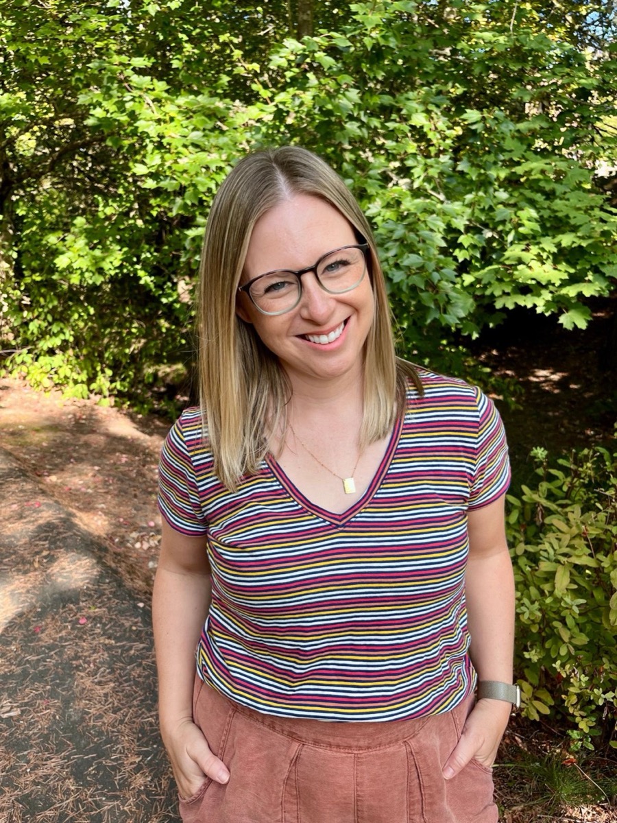 Elizabeth Orthmann, LMFT, smiling outdoors