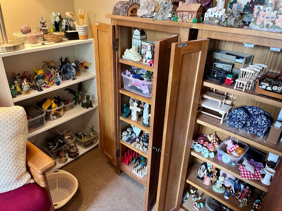 Shelves and cabinets of sandtray miniature figures